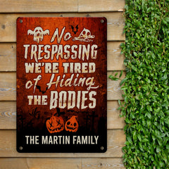 Personalized Name Saying No Trespassing Halloween Metal Sign – Funny Halloween Meme We’re Tired Of Hiding The Bodies Metal Sign